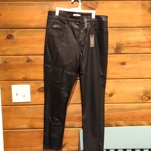 Skinny coated black jeans